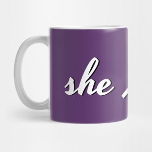 she / her (upper corner script) Mug